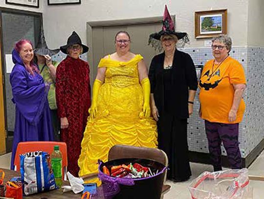 Ladyslippers Hand Out Spooky Treats at Legacy Center